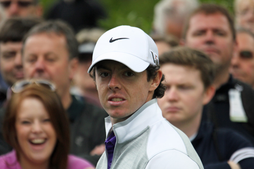 Rory McIlroy amidst crowd of onlookers during a practice day for the 2013 BMW PGA Championship at Wentworth Club.