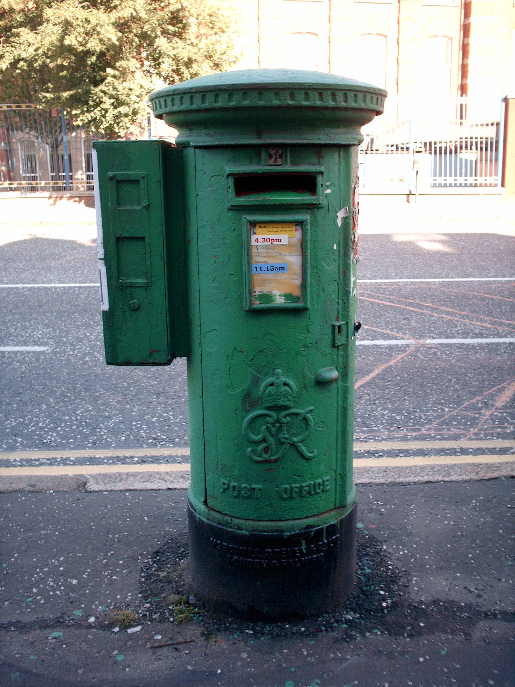 Green postbox on Belfast's Falls Road